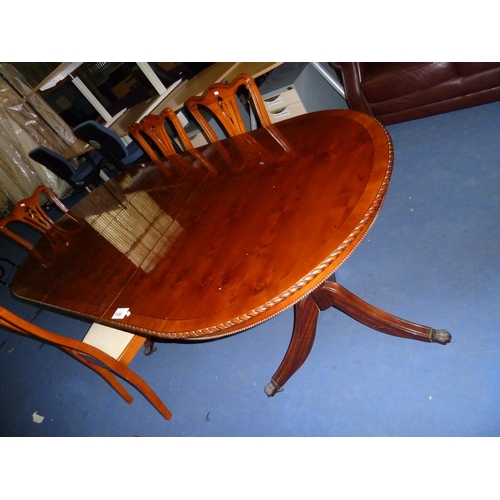 1126 - 1 reproduction dining suite comprising of an oval centre extending dining table with 6 chairs, 1 hi-... 