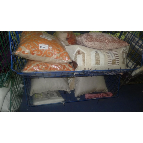 1391 - A quantity of various cushions. Contents of 2 mesh stacking baskets which are not included