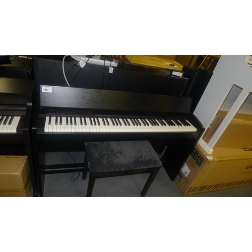 145 - 1 Roland digital electric piano type F140R RRP £939 - comes with leads and piano stool - 240v trade