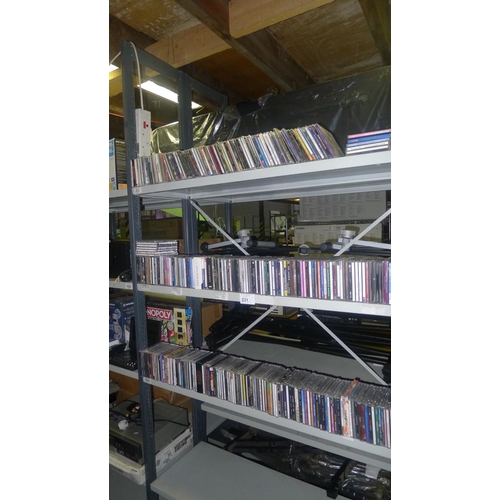 231 - A large quantity of audio CDs contents of three shelves