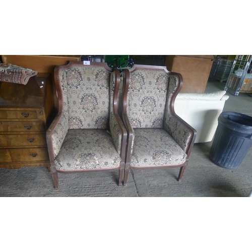 46 - 2 vintage wood framed arm chairs with floral pattern upholstery