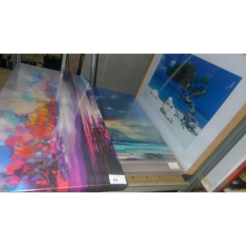 85 - 2 art prints on canvas and 1 framed print. Combined RRPs in region of £130. Contents of one shelf