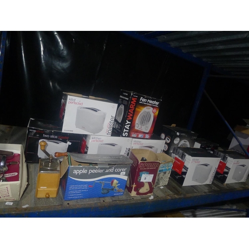 9 - A quantity of various items including toasters, heaters, an egg beater, a bean slicer etc. Contents ... 