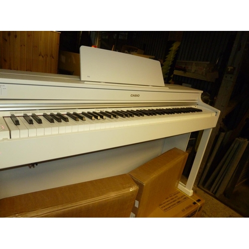 147 - 1 boxed Casio digital electric piano type Celviano AP470 RRP £899 - comes with leads and piano stool... 