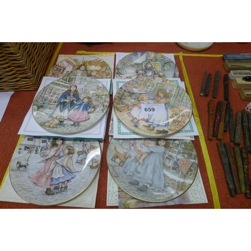 659 - A set of six decorative Christmas plates