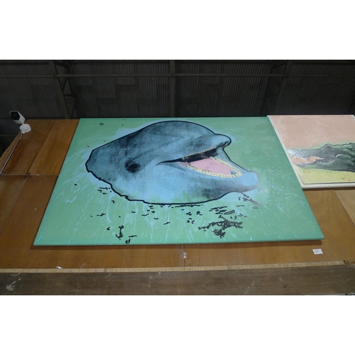 711 - An unframed oil on canvas of a dolphin