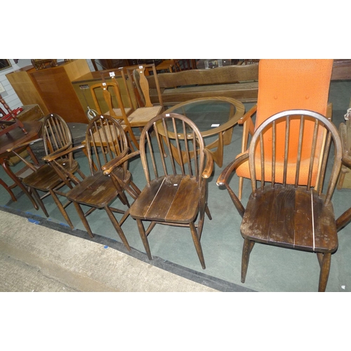 721 - A set of 4 rail back kitchen elbow chairs