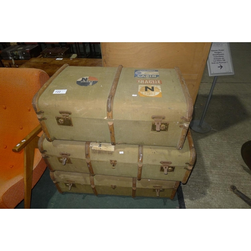 722 - A set of 3 vintage wooden bound cabin trunks