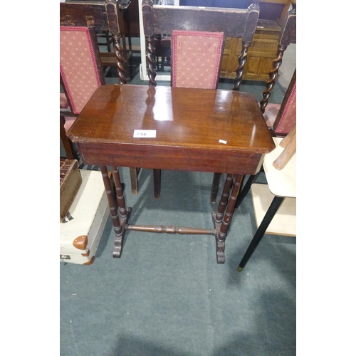 736 - An Edwardian mahogany rectangular top sewing table with a small drawer on turned legs