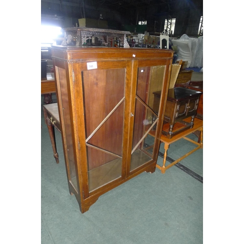 740 - A mahogany display cabinet with two glazed doors