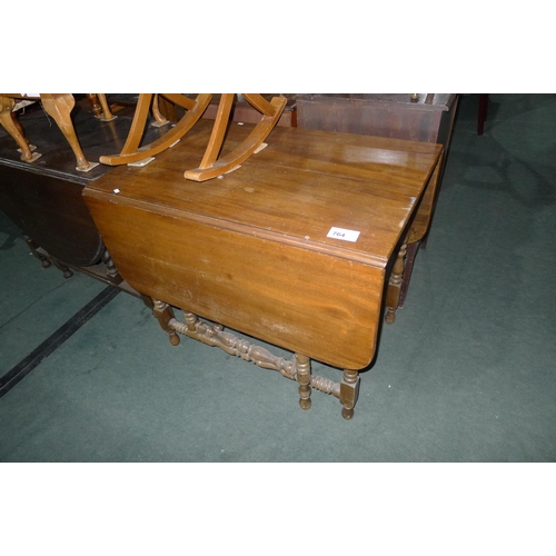 764 - A rectangular top mahogany drop leaf gateleg table