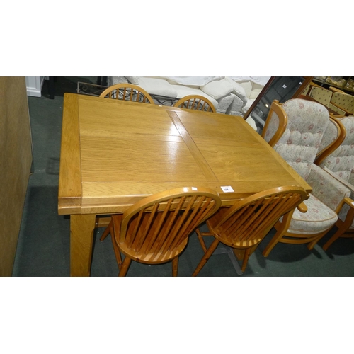 104 - 1 oak extending dining table & 4 pine chairs