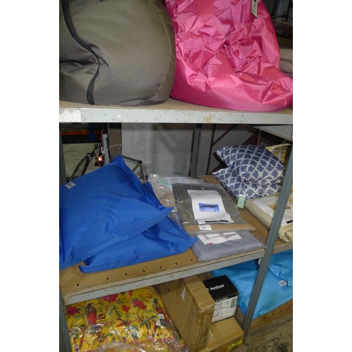 72 - A quantity of various items including 2 bean bags, cushions, covers etc. Contents of one bay / 3 she... 