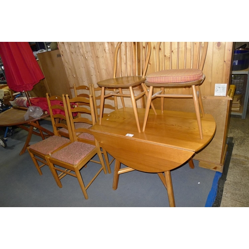 90 - 1 Ercol drop leaf wooden dining table, 2 Ercol round top dining chairs and 4 other wooden dining cha... 