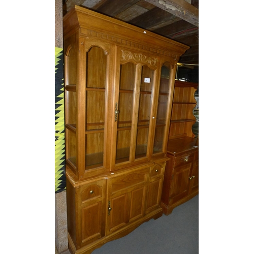 94 - 1 wooden display cabinet with 1 glass door above and 1 wooden door below