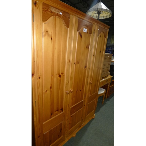 98 - 1 pine triple door wardrobe