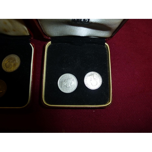 606 - A small quantity of Maundy money, a silver salt with spoon and a silver backed brush