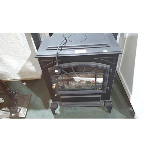 83a - 1 electric fire in the style of a log burner by Burley,