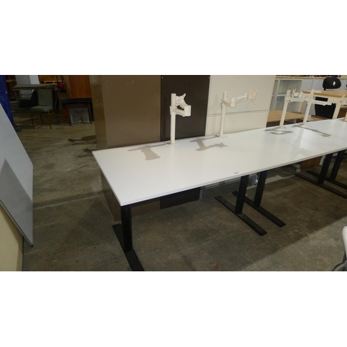 1062 - 1 white rectangular office table with 2 monitor support arms attached  (approx size 140x80cm) - NO p... 