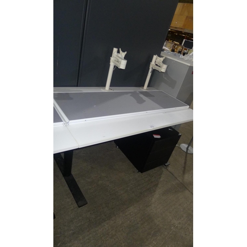 1072 - 1 white rectangular office table with 2 monitor support arms attached  (approx size 140x80cm)  1 und... 