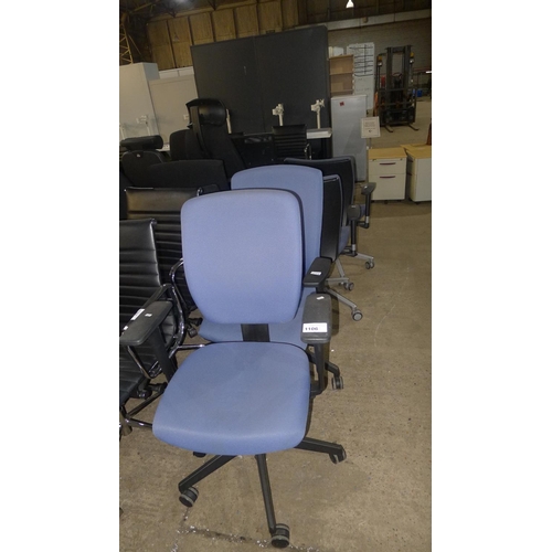 1106 - 2 blue upholstered office swivel chairs