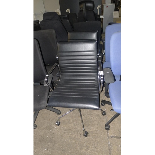 1107 - 2 black upholstered chrome framed office swivel chairs