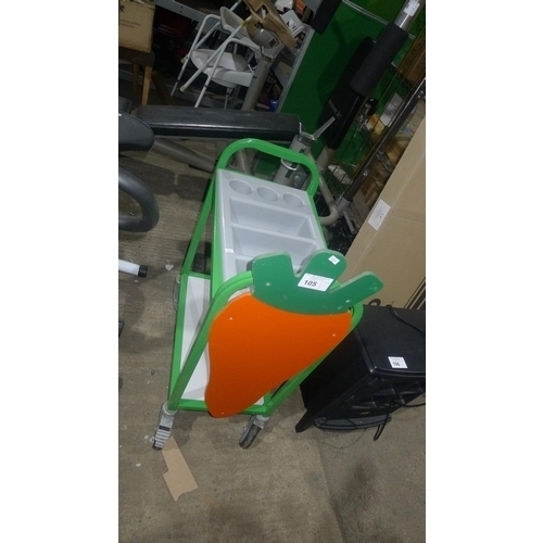 105 - 1 green framed trolley with grey plastic cutlery tray insert and a painted carrot decoration on one ... 