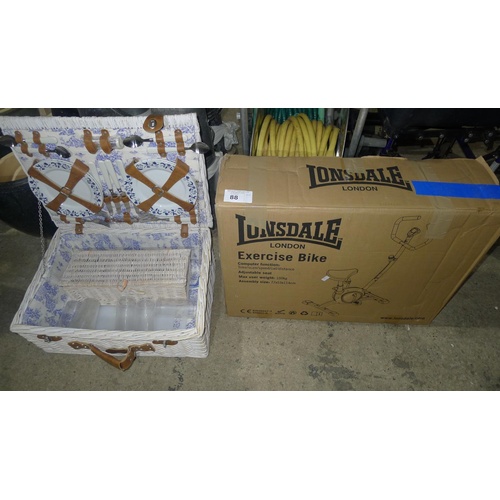 88 - 1 Lonsdale exercise bike (boxed) & 1 picnic basket