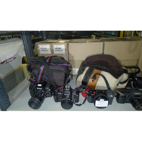 259c - A quantity of various cameras and lenses including a Nikon N90s, a Nikon F-500/af, a Fuji HDM & a Ca... 