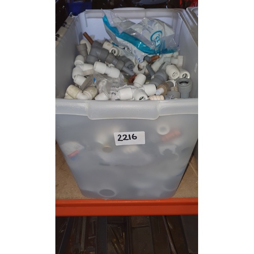 2216 - 4 plastic crates containing a quantity of various white plastic pipe fittings including 40mm/35mm so... 