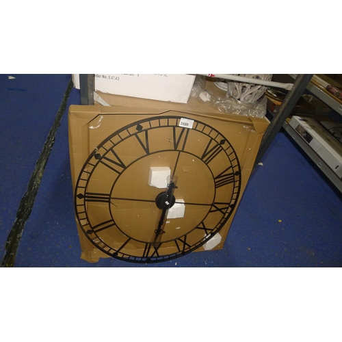 3599 - An oversized metal wall clock