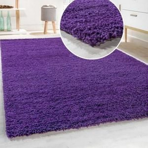 3063 - A large purple shaggy rug approx 300 x 400cm RRP £199