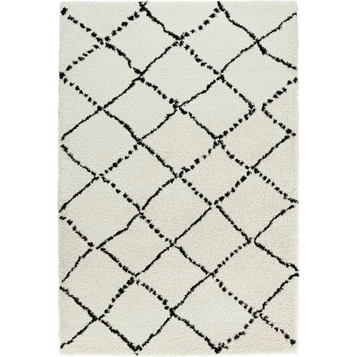 3075 - A large cream shaggy rug with black trellis design approx 200 x 290cm RRP £239.99