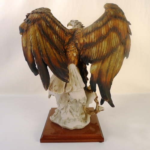 11 - A resin figure bird of prey 38 cm tall