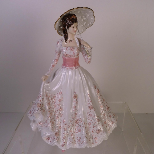 136 - A Royal Worcester figurine of a lady 