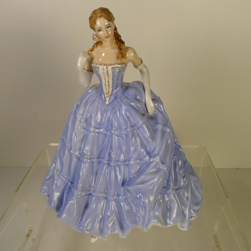 137 - A Royal Worcester figurine of a lady 