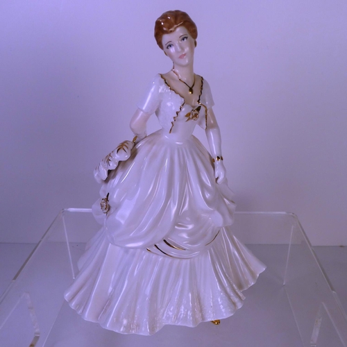 138 - A Royal Worcester figurine of a lady 