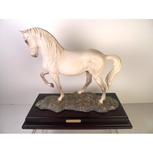 140 - A Royal Doulton white horse 