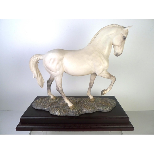 140 - A Royal Doulton white horse 