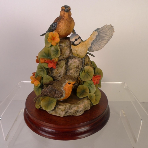 145 - A resin group of birds 19cm tall