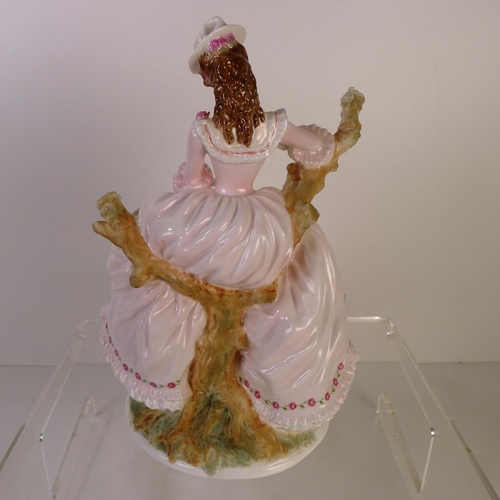 148 - A Royal Worcester figurine of a lady 