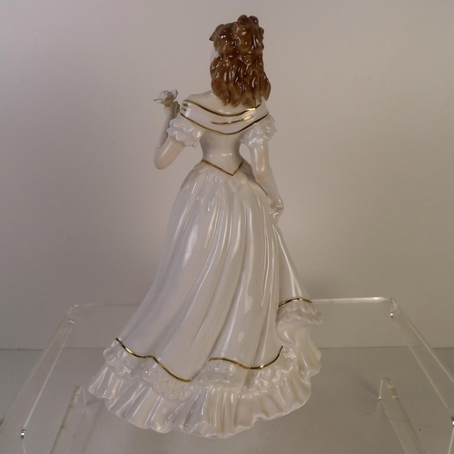 150 - A Royal Worcester figurine of a lady 