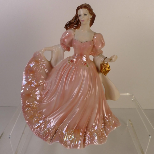 152 - A Royal Worcester figurine of a lady 