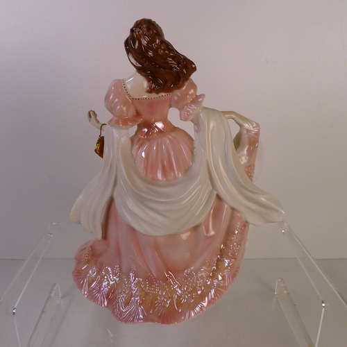 152 - A Royal Worcester figurine of a lady 