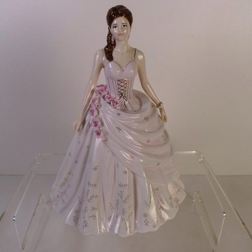 153 - A Royal Worcester figurine of a lady 