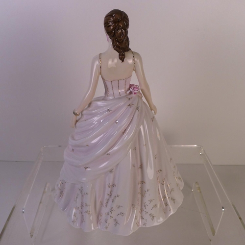 153 - A Royal Worcester figurine of a lady 