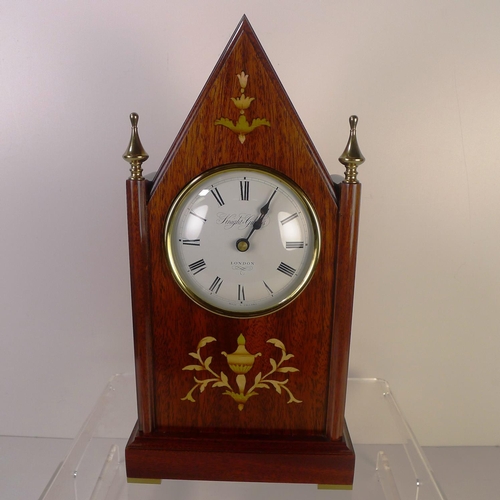 157 - A marquetry inlaid mahogany gothic style mantel clock by Knight and Gibbins, 32cm tall