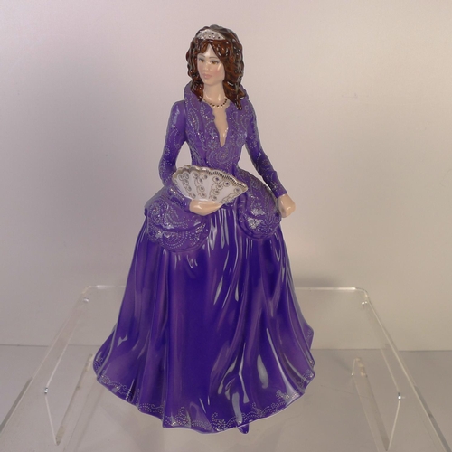 162 - A Royal Worcester figurine of a lady 