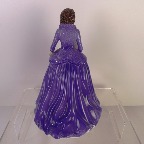 162 - A Royal Worcester figurine of a lady 