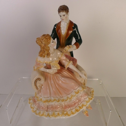 164 - A Royal Worcester figurine of a lady 